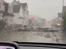 Tornados, flash floods and 95mph winds spark chaos in top tourist destinations in Spain, Italy and France as wild storms lash Europe
