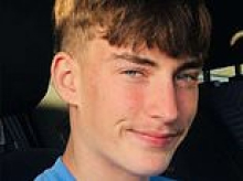 Boy, 17, acted 'devastatingly out of character' as he stepped out in front of train hours after 'happily' sipping pints with friends, coroner hears