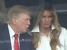What Trump and Melania appeared to whisper during 'intense' VIP suite exchange... as Natalie Harp stood just behind them