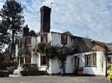 Saved with seconds to spare: Widow, 89, is rescued from her thatched home just moments before it goes up in flames in devastating Stourbridge inferno