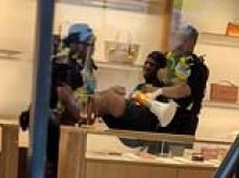 Moment animal rights activists raid luxury Loro Piana store in London - as terrified customers are trapped inside during 'lock in'