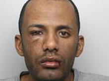 Sudanese asylum seeker who arrived in UK after claim was rejected in France lay in wait on high street for lone woman before slashing her 30 times with a broken bottle