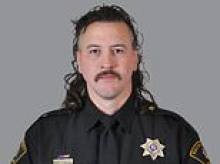 Cop with aggressive mullet haircut blames daughter, 3, for shooting man, 40, and his seven-year-old son during turkey hunting debacle