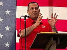 Trump-backed candidate scrubs ALL mentions of the president as alarm bells ring in deep red seat