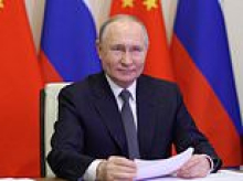 Is Putin about to wage war on Europe? Fears Russia could launch drone attacks or stage Baltic island invasion after CIA chief's mystery visit to Moscow