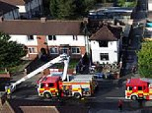 Murder probe after two people die in house fire feared to be 'gangland revenge attack' linked to youths killed in A66 crash