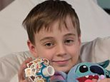 Boy punched on Melbourne street allegedly by a stranger who then stabbed his mother is suffering from brain cancer