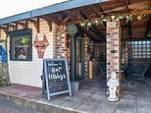 Inside the backyard boozer crowned Britain's Pub Shed of the Year... after its owners spent £25,000 on creating an at-home sports bar