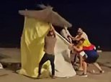 Locals fighting to remove thousands of migrants who remain in Ceuta following 'invasion' destroy makeshift camp as fears grow over groups of men roaming the streets