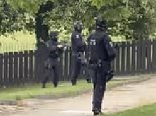 Hundreds of police from across England are drafted in to restore order in Middlesbrough as town teeters on the brink of gang war