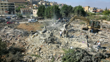 V izraelskem napadu na stanovanjsko hišo na jugu Libanona ubitih 12 ljudi