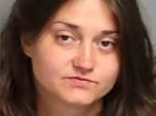 Elderly woman found dead in community pool as police arrest her 30-year-old 'acquaintance' for murder