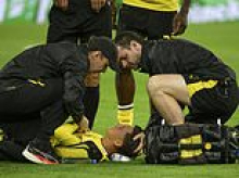 Borussia Dortmund star rushed to hospital after slumping to the pitch with 'circulatory problems' during Champions League tie