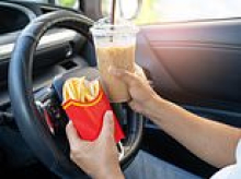 Queensland driver in big trouble with police after being caught eating and driving