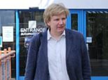 Cambridge lecturer who called passenger 'jihadist' and told him to 'blow himself up' in drunken outburst on BA flight avoids jail