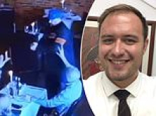 Disgraced attorney tries to SHOOT his ex-wife at dinner table in front of horrified guests before being tackled to the ground by waiter