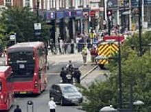 Four stabbed in London by 'machete-wielding gang running through high street'