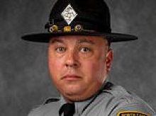 Trooper is charged for murdering lovelorn sheriff's deputy after love triangle with ex-girlfriend turned sour