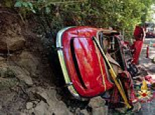Brit motorist is killed and his wife is seriously injured during vintage car rally after vehicle crashes off scenic road in Italy