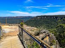Woman suffers head injuries after 30m fall from Blue Mountains cliff while rock climbing with group