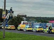 Two children, 11 and 13, and woman, 21, are rushed to hospital after fairground ride 'malfunction'