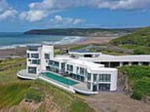 Revealed: Grand Designs' 'saddest ever house' - a £10m Devon lighthouse that bankrupted owner and destroyed his marriage - is now at centre of a money-laundering probe