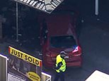 Two women critical after collision with police car