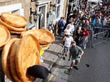 Hundreds of revellers flock to market town to watch annual World Black Pudding Throwing Championships
