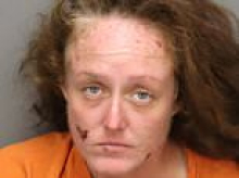 Woman is set on FIRE by stranger while pumping gas after she refused to hand over cash... as lawmaker speaks out over 'horrific' attack