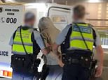 Cops swoop on man accused of sharing vile extremist material moments before he boarded plane to Afghanistan