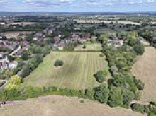 The village set to be swallowed by 5,900 new homes: Fury over plans for huge South Downs housing development that would 'merge' tiny community with neighbouring towns