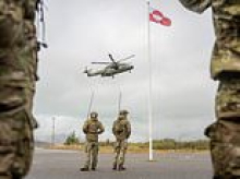 Russian frigate fires two flares at Danish military chopper, narrowly missing the NATO aircraft as Putin becomes increasingly aggressive