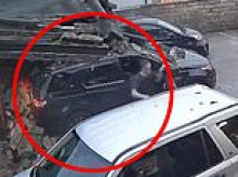 Moment Range Rover driver rams car and ploughs into building in rage after row over a woman