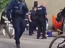 French cop is investigated after he's filmed throwing man to the ground at a festival - and the young man dies 13 days later