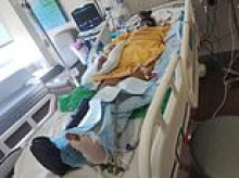 Mom-of-four left fighting for life after hit-and-run driver rammed her off bike as family hunts for culprit