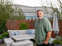 Homeowner has £170,000 wiped off value of his dream house after FOUR 60ft-high mega warehouses are built next door