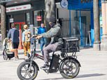 Masked men pictured on the streets of Nottingham on the first day of 'balaclava ban' as locals says there are not enough police to enforce crackdown