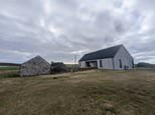 Come and live in a new house with all mod-cons on a tiny island, home to just 102 people, for only £550 per month...
