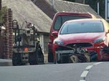 Bomb squad called and homes evacuated after 'substances' found in residential street - as woman, 35, is charged over 'explosives'