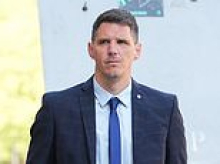 Celebrity police officer who asked colleague to send him female suspect's sex video so he could show 'the lads from footy' is jailed for four years