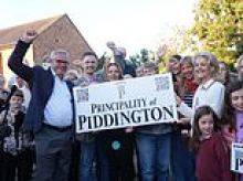 Up to 500 councillors from villages across Britain consider holding their own independence referendums after Piddington migrant camp protest vote