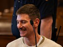 Grinning model showcases new facial hair as he stands accused of knifing his hunk husband to death in their NYC apartment