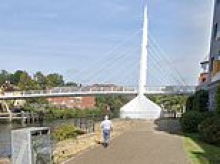 Man in his 30s is arrested after teenage girl 'raped under bridge in daylight attack'