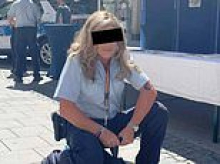 Pictured - 6ft transgender paedophile anti-terror cop who raped girl, 15, in McDonald's toilet in Germany: Image shows her riding toy police car at community event