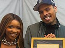 Chris Brown torches Texas Democrat who joined Jasmine Crockett to honor him on stage and then APOLOGIZED