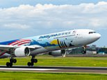Man dies on Malaysia Airlines flight to Sydney before plane lands - as emergency crews rush to airport