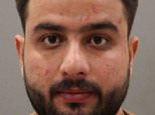Afghan migrant who raped two 14-year-old girls at his flat after grooming them on Snapchat and plying them with vodka is jailed for 14 years