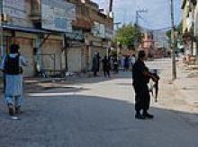 Bombing kills at least 15 and wounds dozens as 'vehicle filled with explosives is driven into Pakistan mosque'