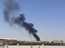 Smoke and flames billow over Riyadh airport in Saudi Arabia as Houthi rebels gain ground