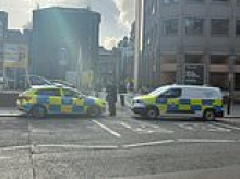 Three men rushed to hospital after stabbing outside gay bar - as police launch hunt for culprit